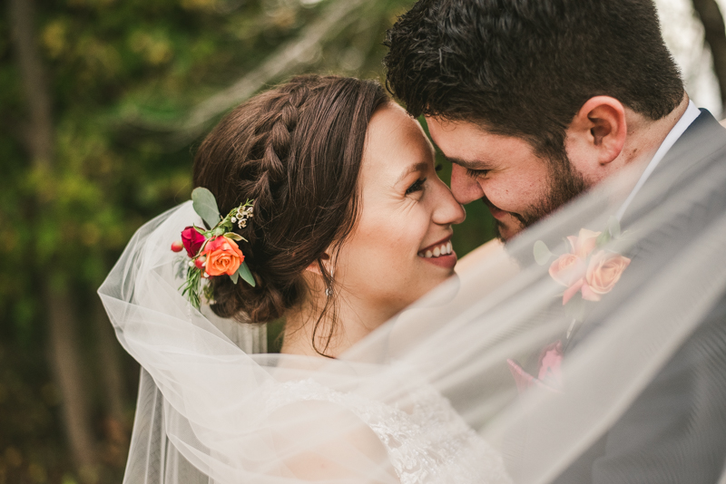 Stunning fall bride and groom just married portraits at The Barn at Pleasant Acres in Maryland. Photo by Britney Clause Photography