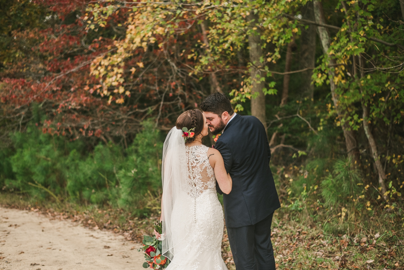 Stunning fall bride and groom just married portraits at The Barn at Pleasant Acres in Maryland. Photo by Britney Clause Photography