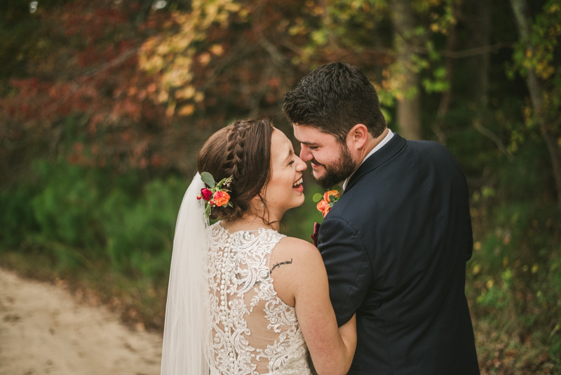 Stunning fall bride and groom just married portraits at The Barn at Pleasant Acres in Maryland. Photo by Britney Clause Photography