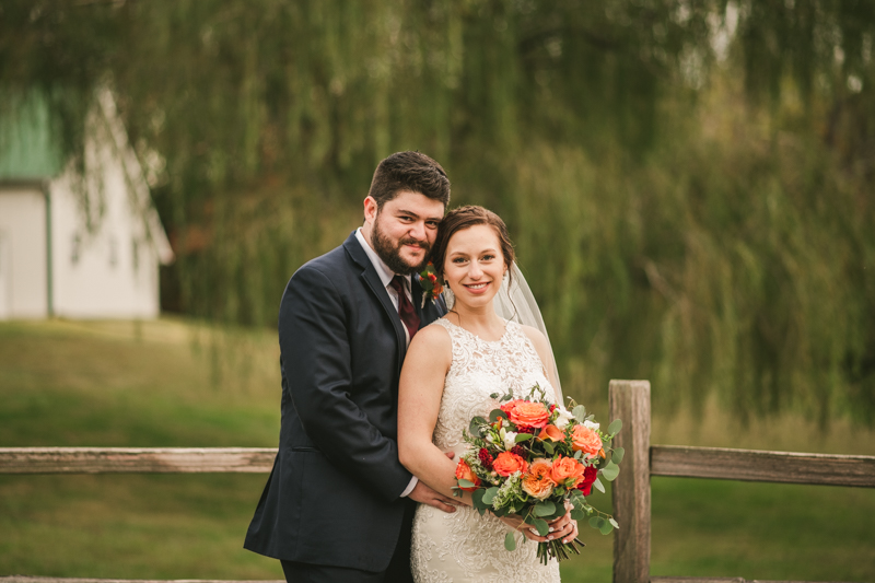 Stunning fall bride and groom just married portraits at The Barn at Pleasant Acres in Maryland. Photo by Britney Clause Photography