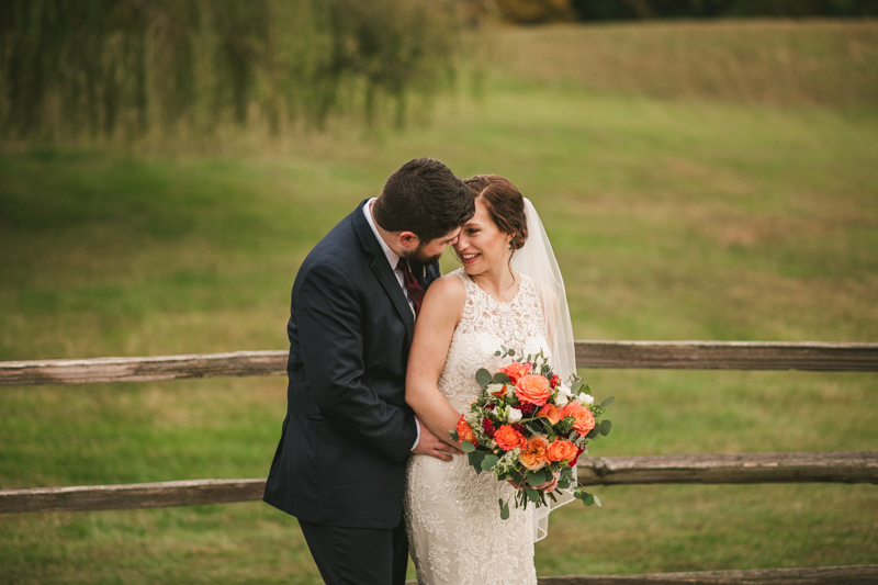 Stunning fall bride and groom just married portraits at The Barn at Pleasant Acres in Maryland. Photo by Britney Clause Photography