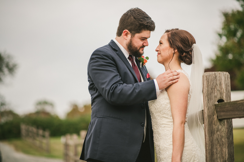 Stunning fall bride and groom just married portraits at The Barn at Pleasant Acres in Maryland. Photo by Britney Clause Photography