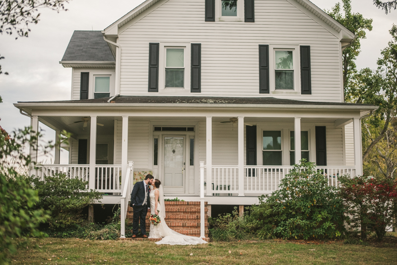 Stunning fall bride and groom just married portraits at The Barn at Pleasant Acres in Maryland. Photo by Britney Clause Photography