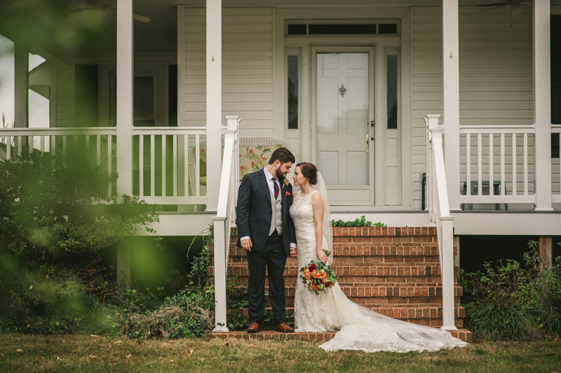 Stunning fall bride and groom just married portraits at The Barn at Pleasant Acres in Maryland. Photo by Britney Clause Photography