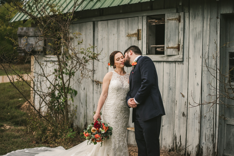 Stunning fall bride and groom just married portraits at The Barn at Pleasant Acres in Maryland. Photo by Britney Clause Photography