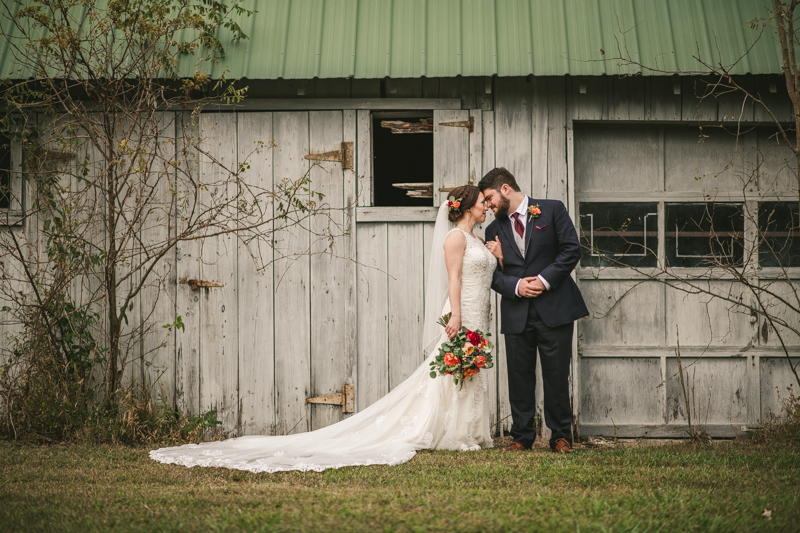 Stunning fall bride and groom just married portraits at The Barn at Pleasant Acres in Maryland. Photo by Britney Clause Photography