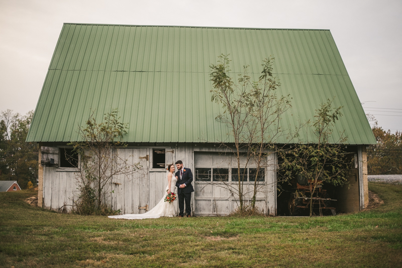 Stunning fall bride and groom just married portraits at The Barn at Pleasant Acres in Maryland. Photo by Britney Clause Photography