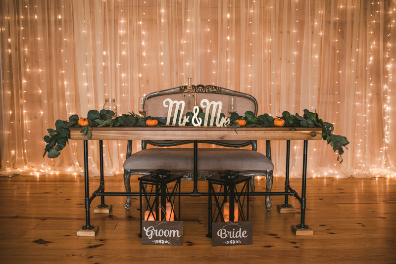 Gorgeous fall wedding reception details at The Barn at Pleasant Acres in Maryland. Photo by Britney Clause Photography