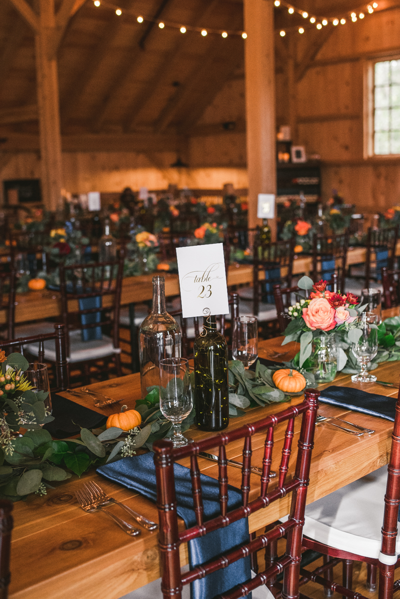 Gorgeous fall wedding reception details at The Barn at Pleasant Acres in Maryland. Photo by Britney Clause Photography