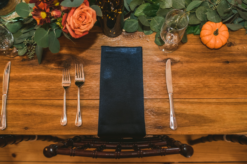 Gorgeous fall wedding reception details at The Barn at Pleasant Acres in Maryland. Photo by Britney Clause Photography