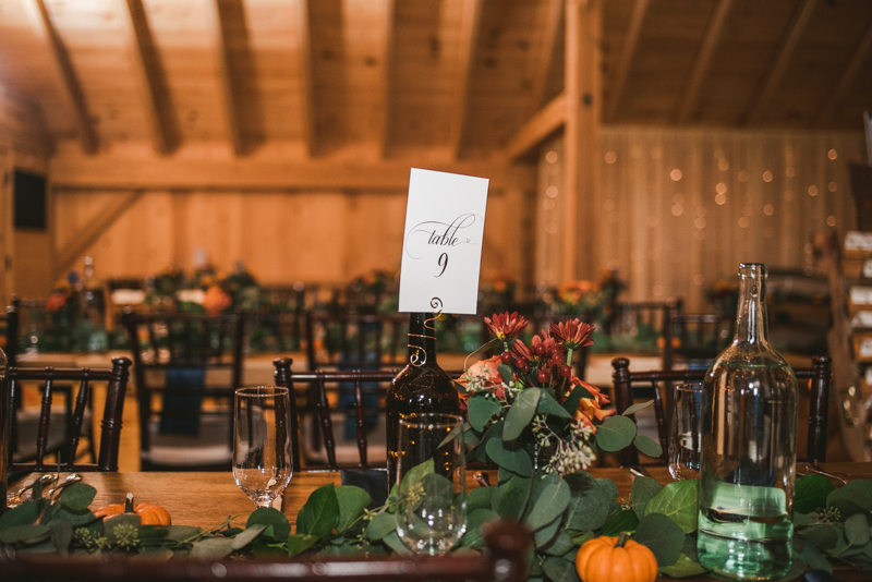 Gorgeous fall wedding reception details at The Barn at Pleasant Acres in Maryland. Photo by Britney Clause Photography