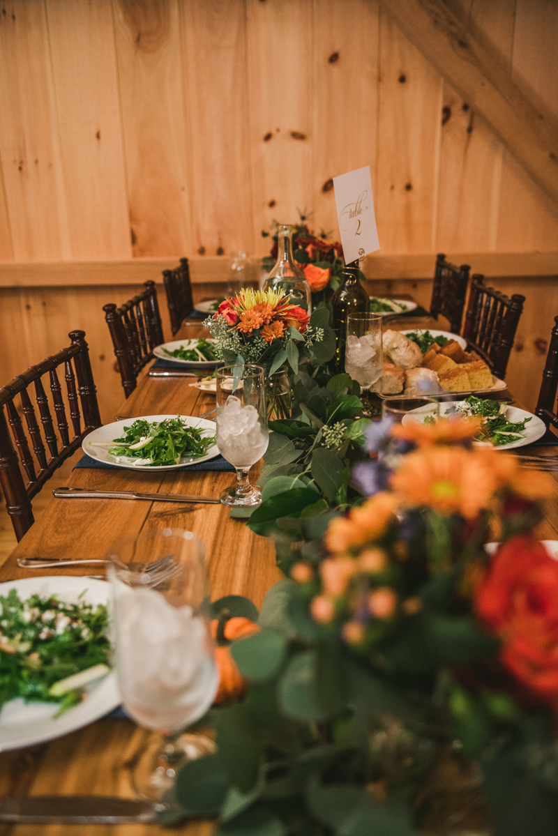 Gorgeous fall wedding reception details at The Barn at Pleasant Acres in Maryland. Photo by Britney Clause Photography