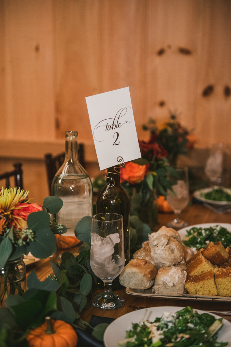 Gorgeous fall wedding reception details at The Barn at Pleasant Acres in Maryland. Photo by Britney Clause Photography