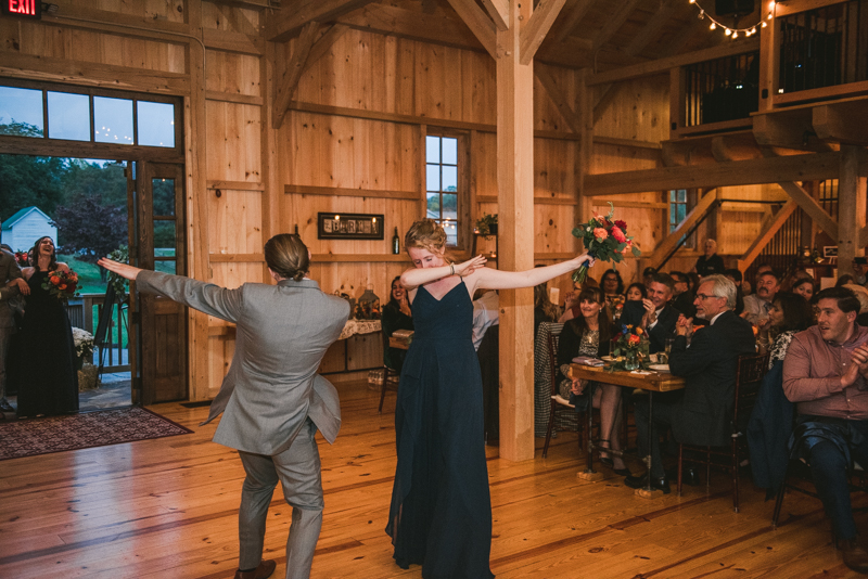 Gorgeous wedding reception at The Barn at Pleasant Acres with music by Washington Talent Agency in Maryland. Photo by Britney Clause Photography