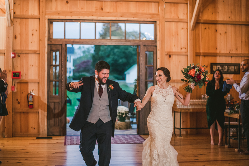 Gorgeous wedding reception at The Barn at Pleasant Acres with music by Washington Talent Agency in Maryland. Photo by Britney Clause Photography