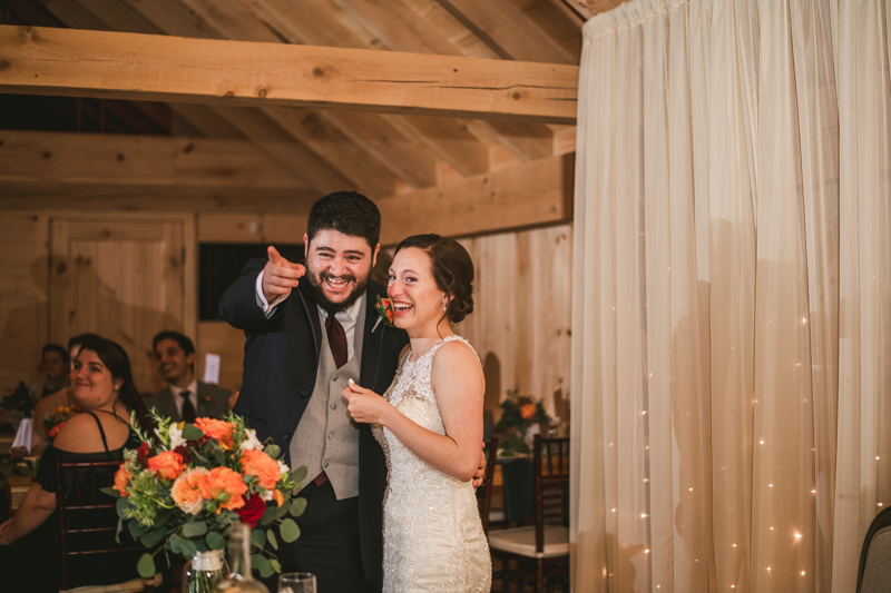 Gorgeous wedding reception at The Barn at Pleasant Acres with music by Washington Talent Agency in Maryland. Photo by Britney Clause Photography