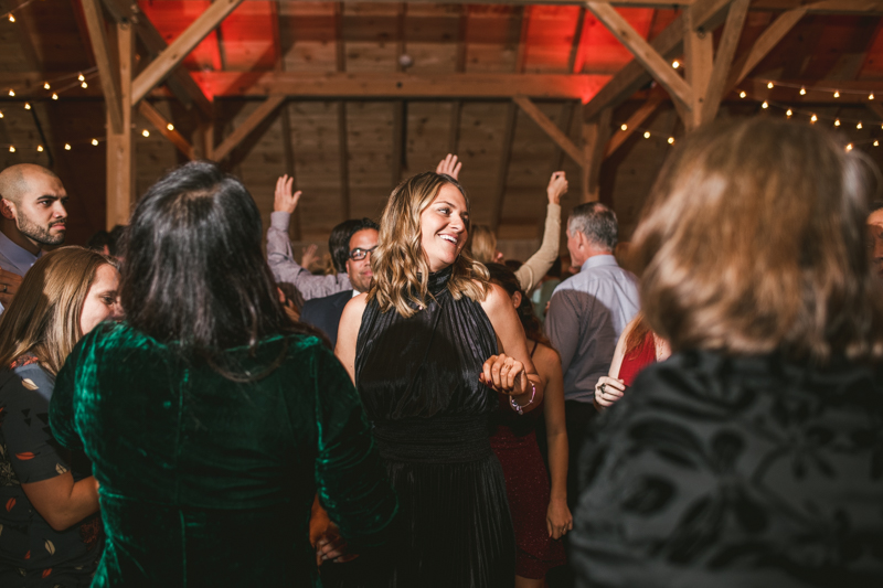 Gorgeous wedding reception at The Barn at Pleasant Acres with music by Washington Talent Agency in Maryland. Photo by Britney Clause Photography