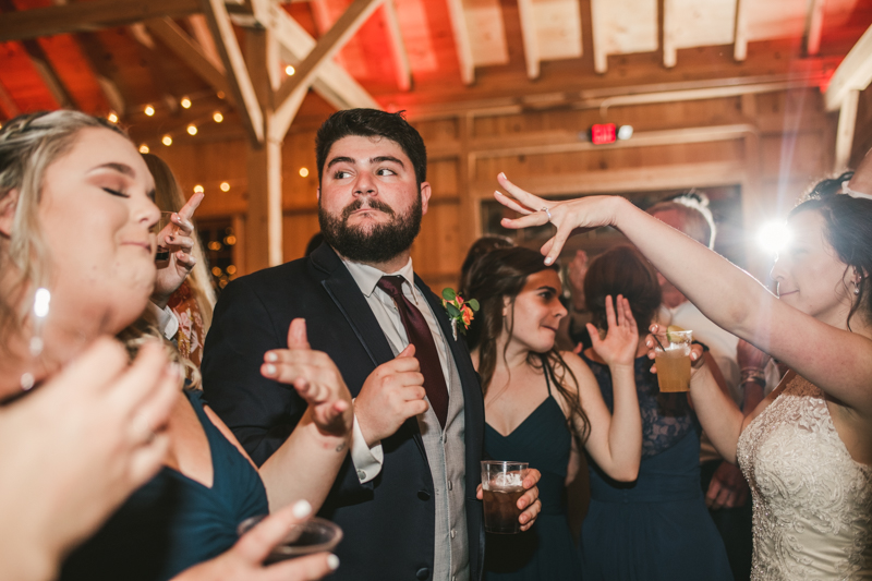 Gorgeous wedding reception at The Barn at Pleasant Acres with music by Washington Talent Agency in Maryland. Photo by Britney Clause Photography