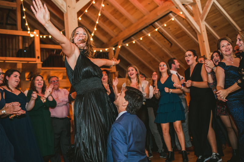 Gorgeous wedding reception at The Barn at Pleasant Acres with music by Washington Talent Agency in Maryland. Photo by Britney Clause Photography