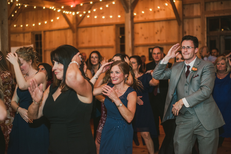 Gorgeous wedding reception at The Barn at Pleasant Acres with music by Washington Talent Agency in Maryland. Photo by Britney Clause Photography