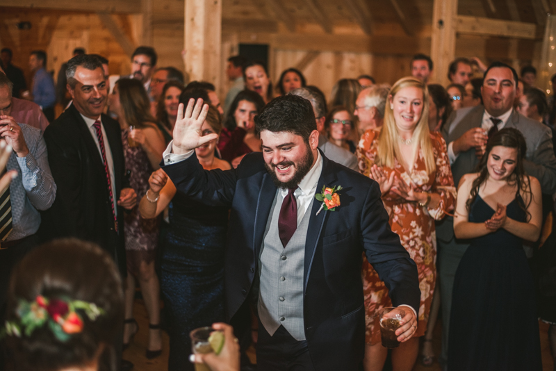 Gorgeous wedding reception at The Barn at Pleasant Acres with music by Washington Talent Agency in Maryland. Photo by Britney Clause Photography