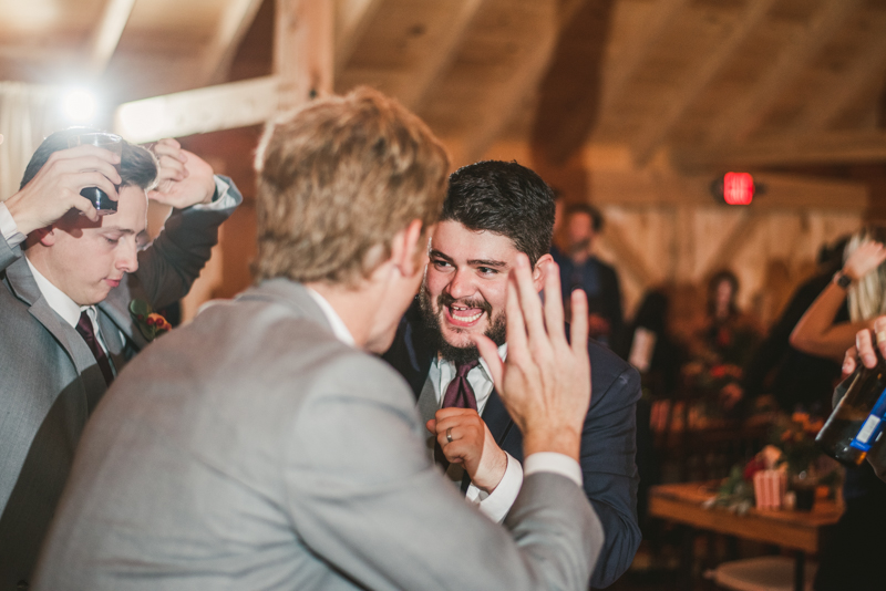 Gorgeous wedding reception at The Barn at Pleasant Acres with music by Washington Talent Agency in Maryland. Photo by Britney Clause Photography