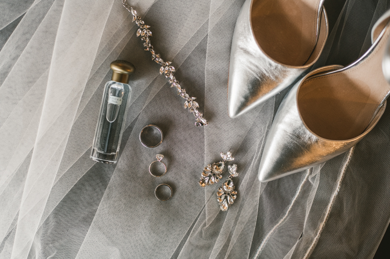 Gorgeous Olive + Piper wedding jewelry at Mt Washington Mill Dye House in Baltimore, Maryland. Captured by Britney Clause Photography