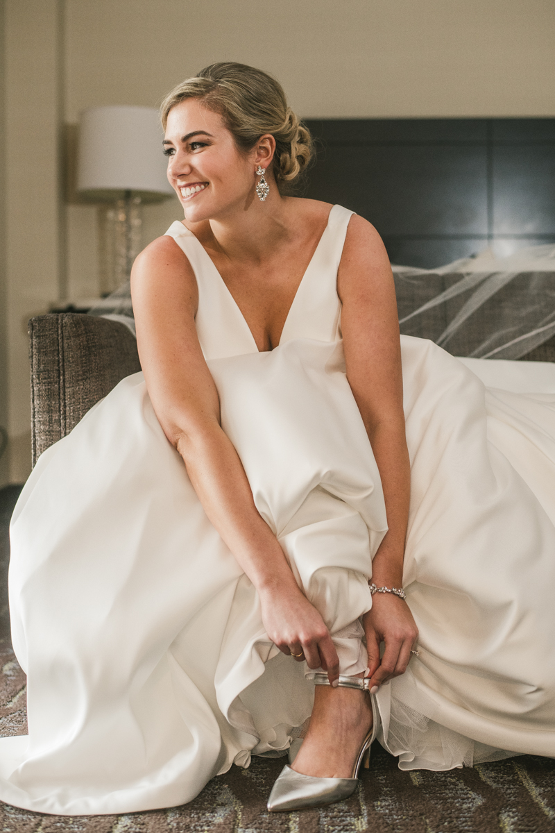 A beautiful wedding dress by Stella York from Garnish Boutique at Mt Washington Mill Dye House in Baltimore, Maryland. Captured by Britney Clause Photography