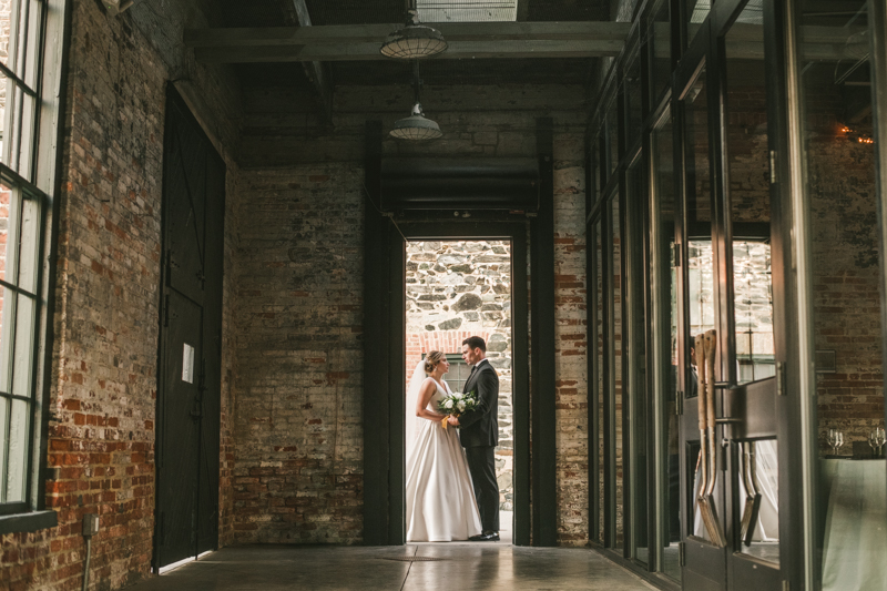 Stunning wedding bride and groom portraits at Mt Washington Mill Dye House in Baltimore, Maryland. Captured by Britney Clause Photography