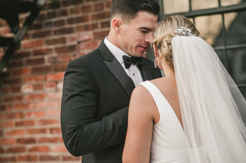 Stunning wedding bride and groom portraits at Mt Washington Mill Dye House in Baltimore, Maryland. Captured by Britney Clause Photography