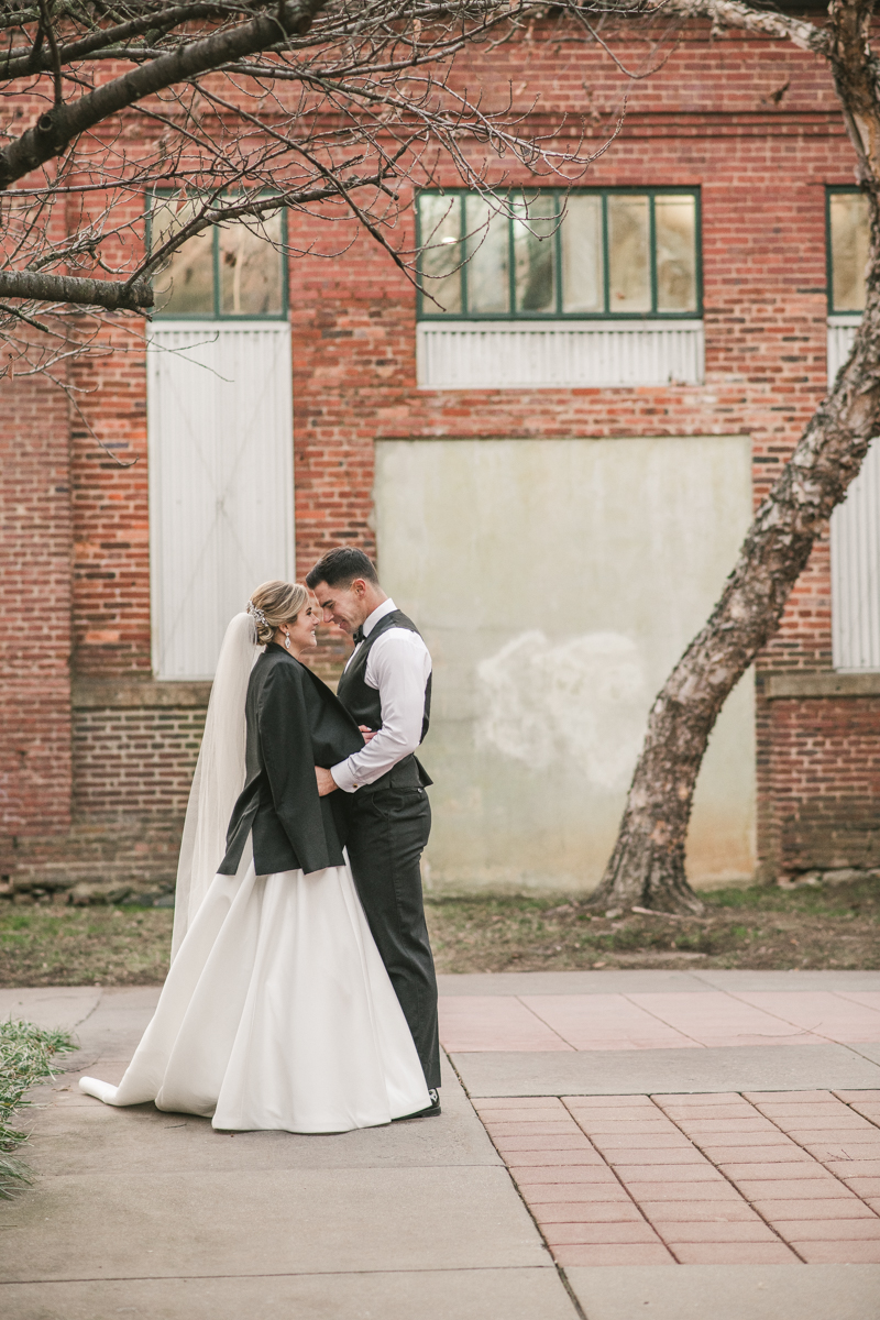 Stunning wedding bride and groom portraits at Mt Washington Mill Dye House in Baltimore, Maryland. Captured by Britney Clause Photography