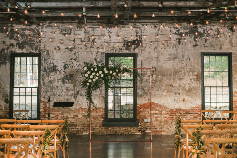 Stunning wedding florals by Violet Floral Designs at Mt Washington Mill Dye House in Baltimore, Maryland. Captured by Britney Clause Photography