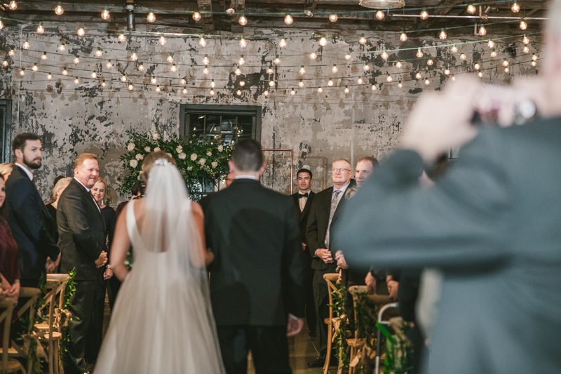 A gorgeous wedding ceremony at Mt Washington Mill Dye House in Baltimore, Maryland. Captured by Britney Clause Photography