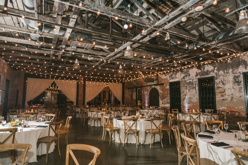 A stylish wedding reception at Mt Washington Mill Dye House in Baltimore, Maryland. Captured by Britney Clause Photography