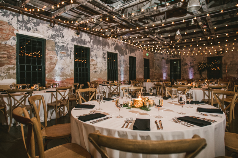 A stylish wedding reception at Mt Washington Mill Dye House in Baltimore, Maryland. Captured by Britney Clause Photography