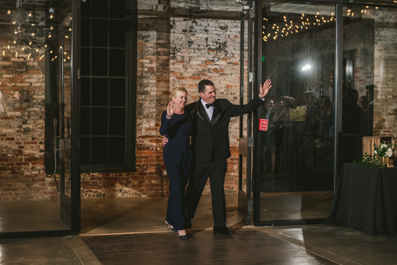 A stylish wedding reception at Mt Washington Mill Dye House in Baltimore, Maryland. Captured by Britney Clause Photography