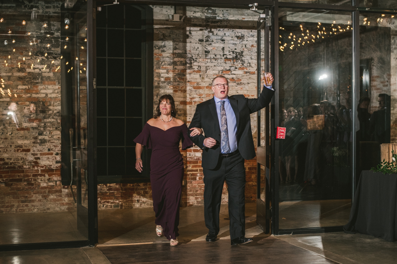 A stylish wedding reception at Mt Washington Mill Dye House in Baltimore, Maryland. Captured by Britney Clause Photography