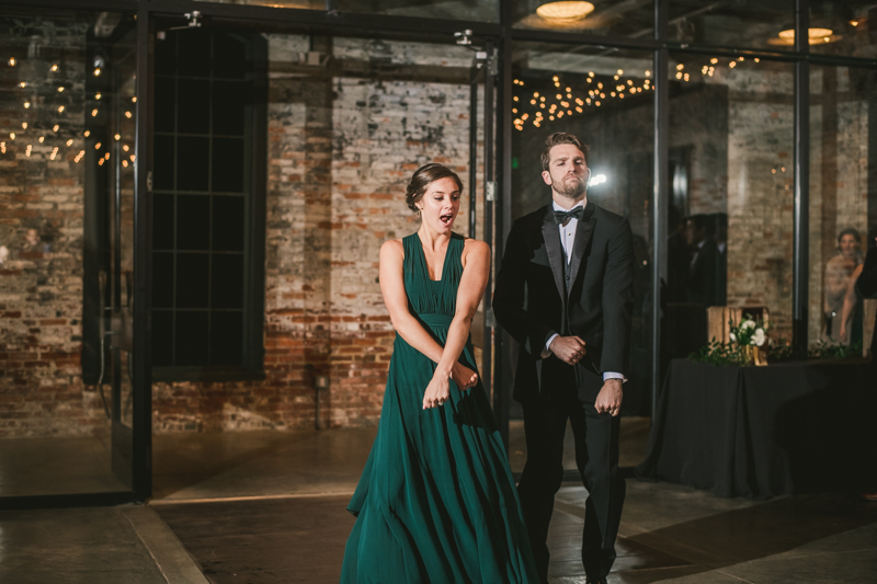 A stylish wedding reception at Mt Washington Mill Dye House in Baltimore, Maryland. Captured by Britney Clause Photography