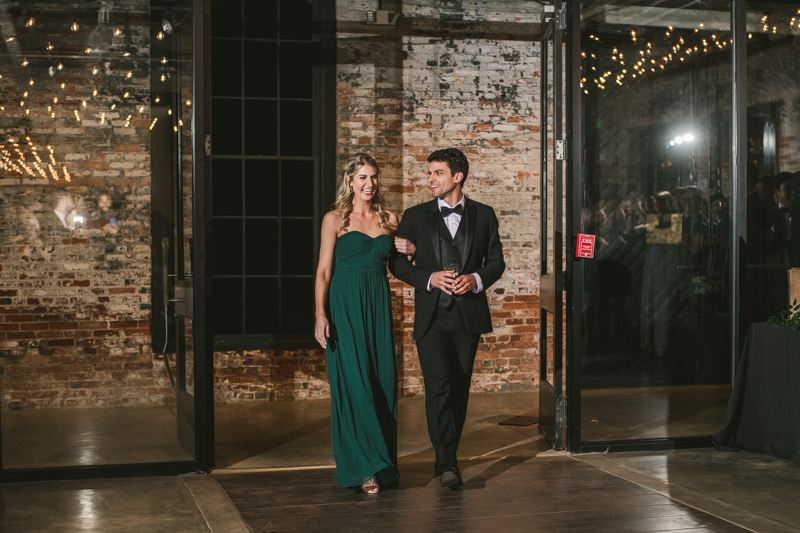 A stylish wedding reception at Mt Washington Mill Dye House in Baltimore, Maryland. Captured by Britney Clause Photography