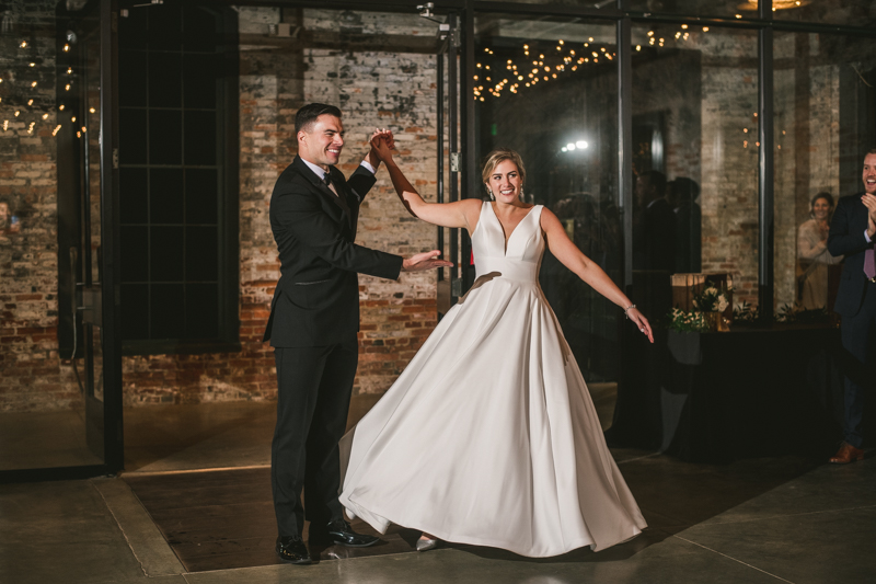 A stylish wedding reception at Mt Washington Mill Dye House in Baltimore, Maryland. Captured by Britney Clause Photography