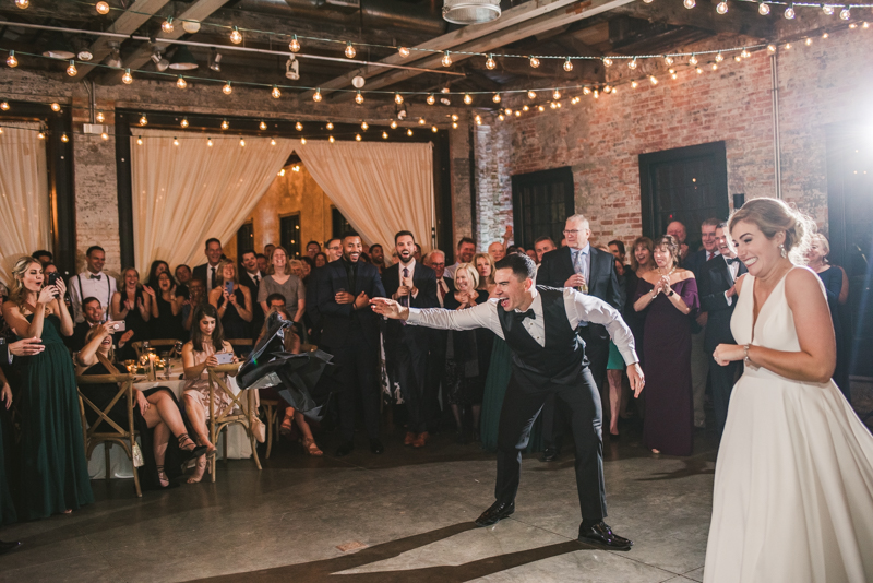 A unique wedding first dance at Mt Washington Mill Dye House in Baltimore, Maryland. Captured by Britney Clause Photography