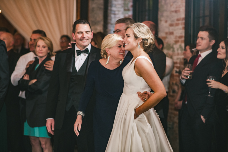 A stylish wedding reception at Mt Washington Mill Dye House in Baltimore, Maryland. Captured by Britney Clause Photography