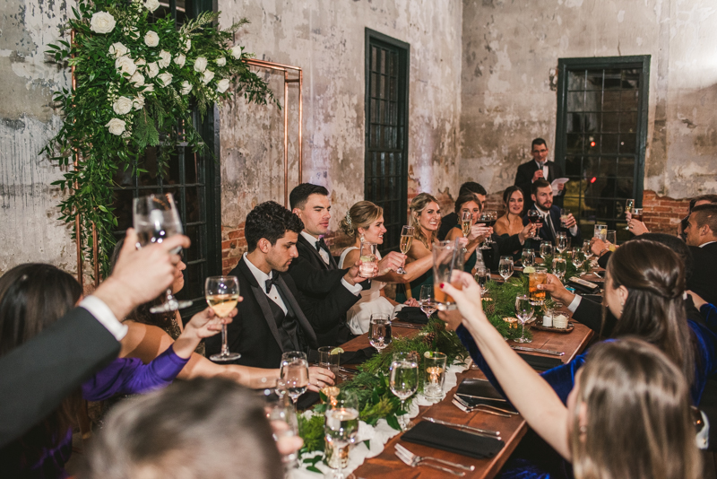 A stylish wedding reception at Mt Washington Mill Dye House in Baltimore, Maryland. Captured by Britney Clause Photography