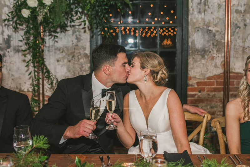 A stylish wedding reception at Mt Washington Mill Dye House in Baltimore, Maryland. Captured by Britney Clause Photography