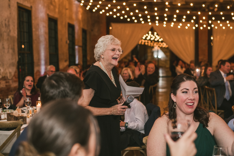 A stylish wedding reception at Mt Washington Mill Dye House in Baltimore, Maryland. Captured by Britney Clause Photography