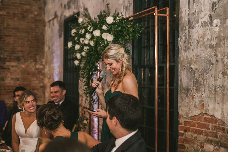 A stylish wedding reception at Mt Washington Mill Dye House in Baltimore, Maryland. Captured by Britney Clause Photography