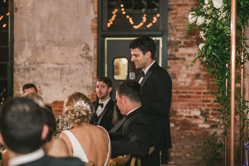 A stylish wedding reception at Mt Washington Mill Dye House in Baltimore, Maryland. Captured by Britney Clause Photography