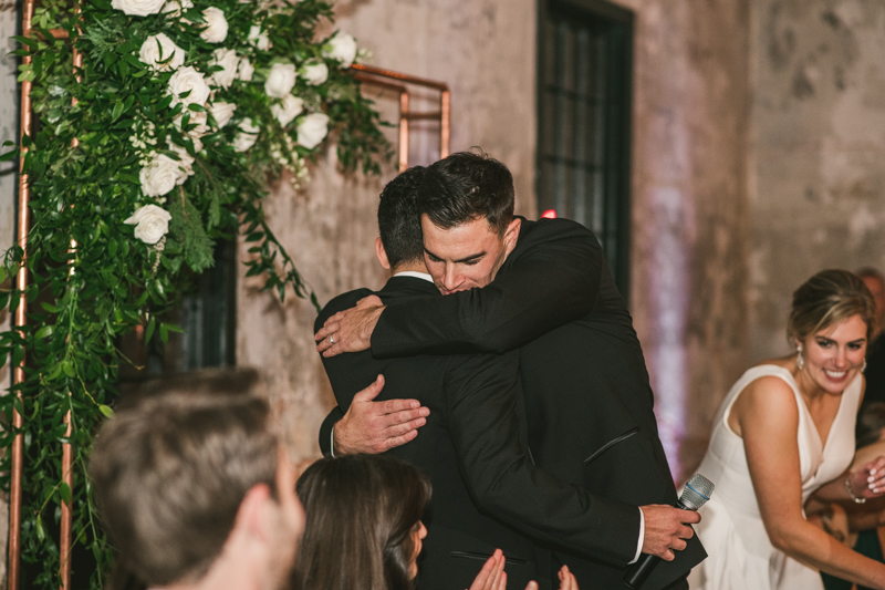 A stylish wedding reception at Mt Washington Mill Dye House in Baltimore, Maryland. Captured by Britney Clause Photography