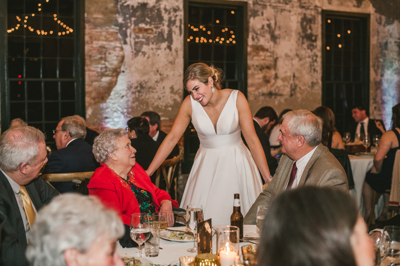 A stylish wedding reception at Mt Washington Mill Dye House in Baltimore, Maryland. Captured by Britney Clause Photography