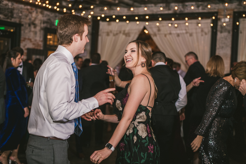 A fun and candid wedding reception at Mt Washington Mill Dye House in Baltimore, Maryland. Captured by Britney Clause Photography